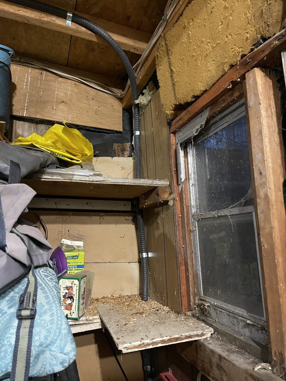 Run continued back toward the panel — FMC bushed and stapled on every joist crossing.