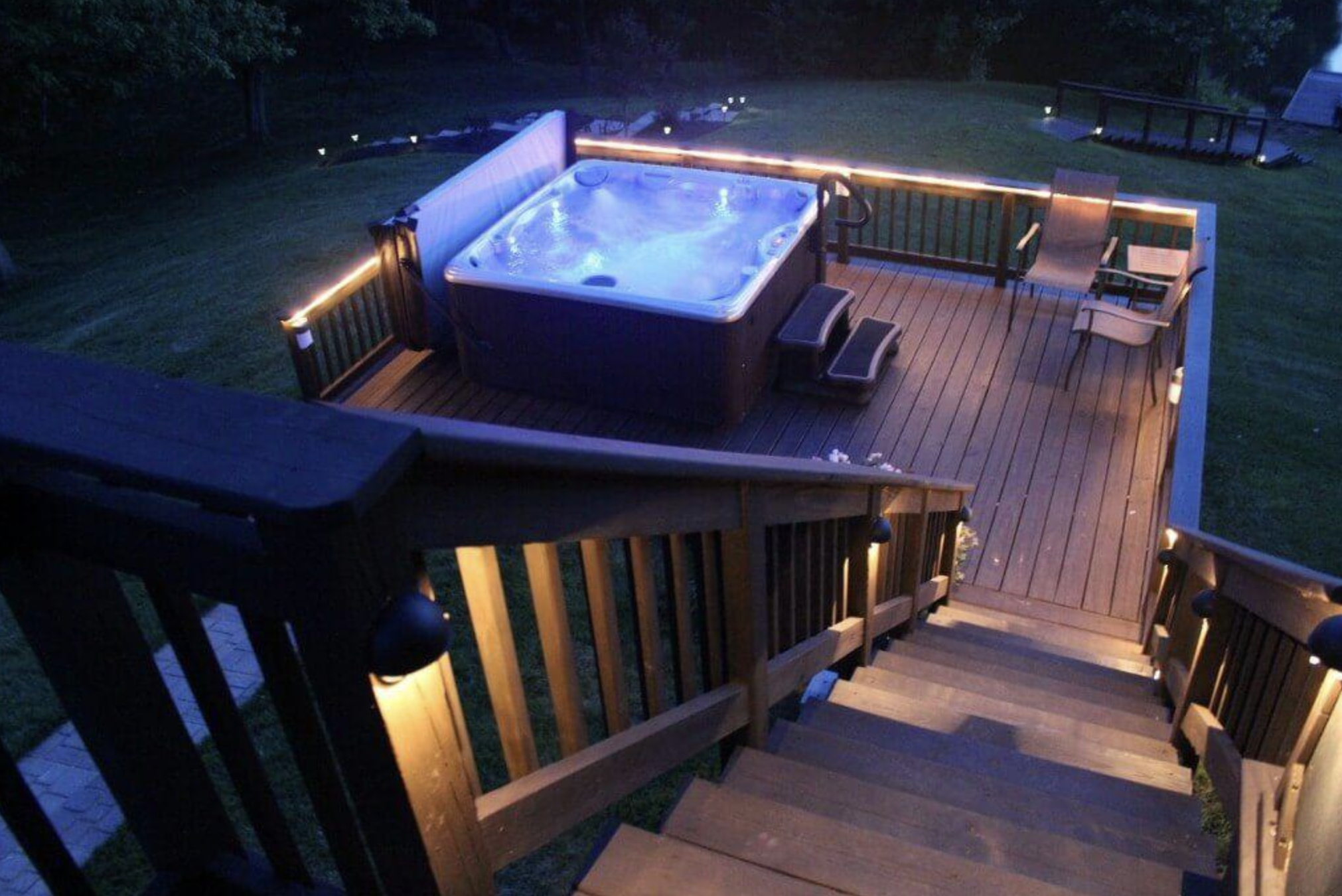 Deck install with low-voltage LED accent lighting added on the same visit — one trip, two upgrades.