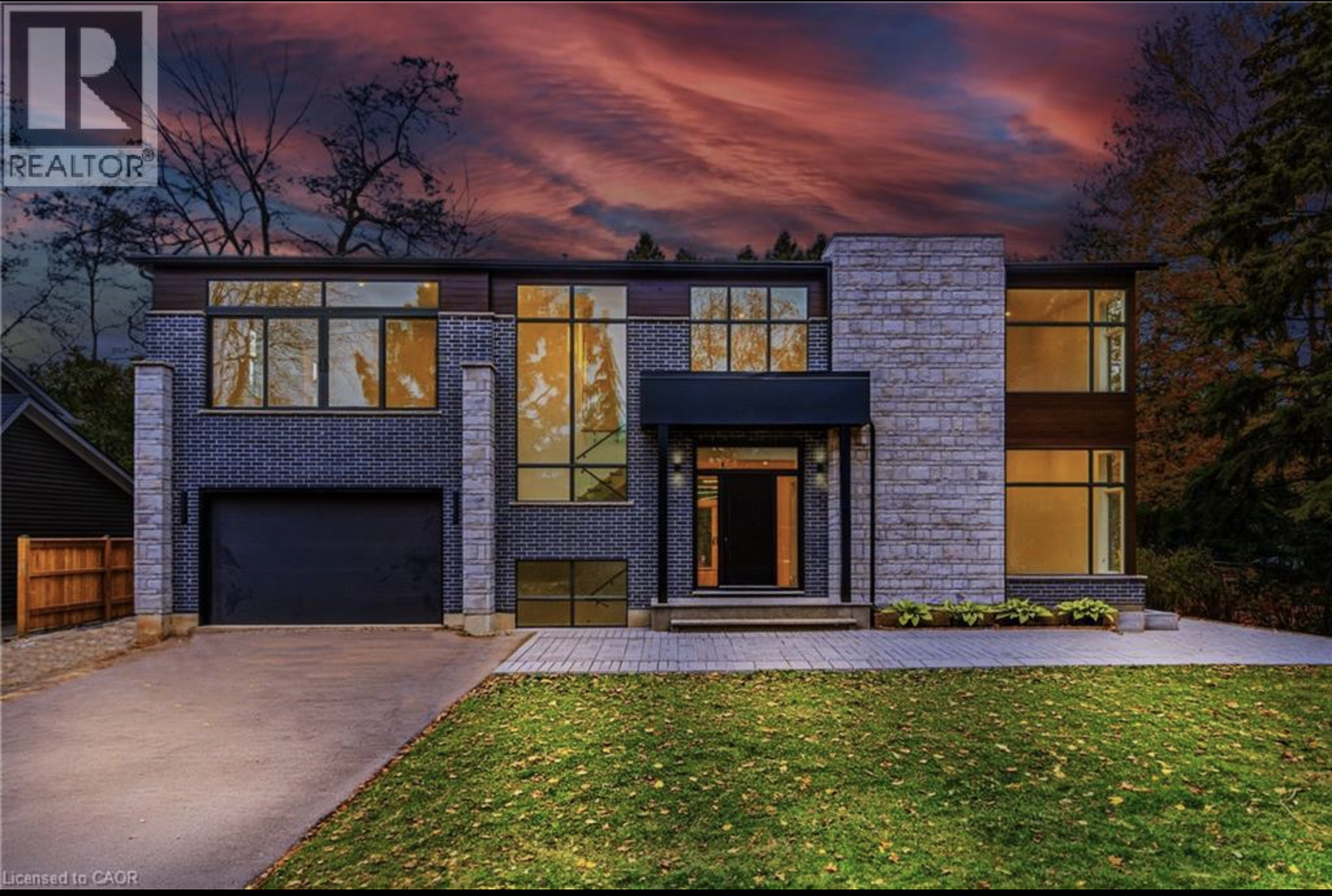 Exterior — accent lighting, soffit pots, EV-ready garage