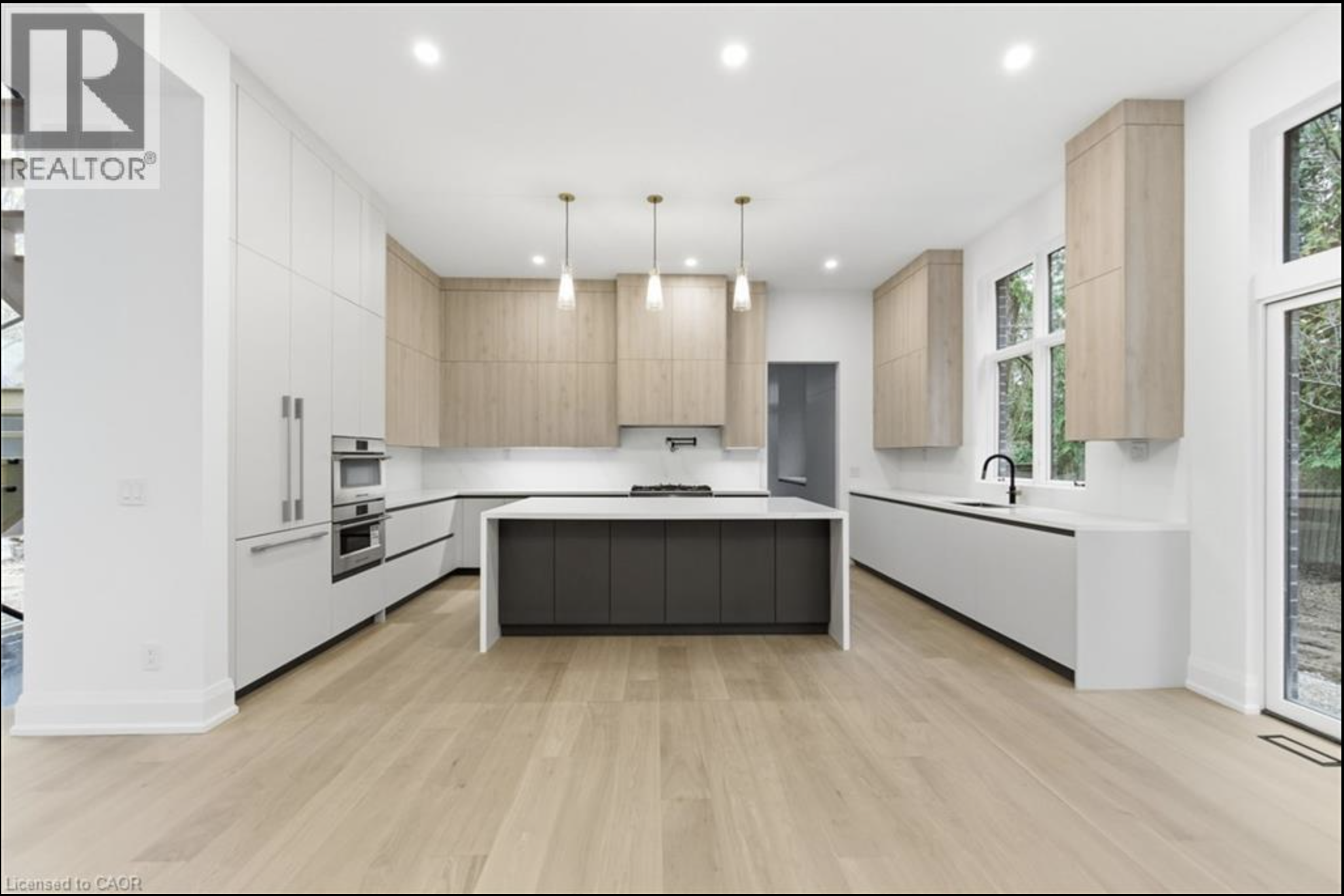 Kitchen — pendant runs over the island, undercabinet on dimmers